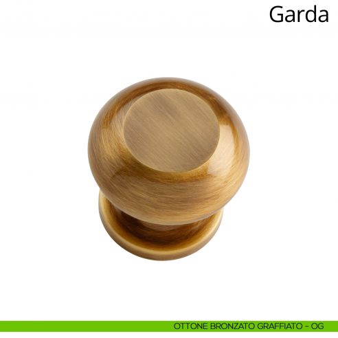 Pomolo per porta fisso Garda Linea Calì ottone bronzato graffiato