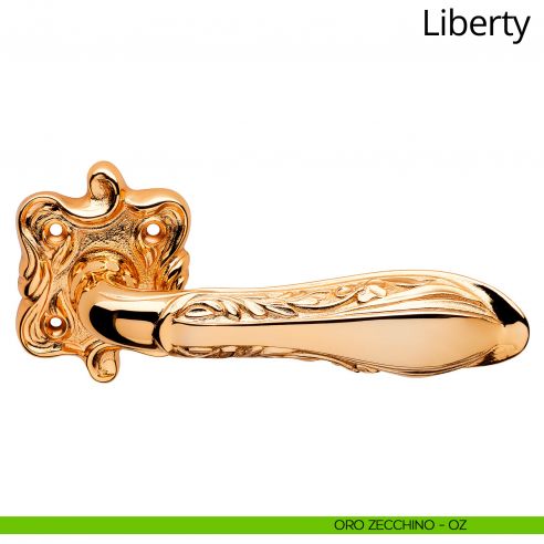 Maniglia per porta interna Liberty Linea Calì con rosetta artistica oro zecchino
