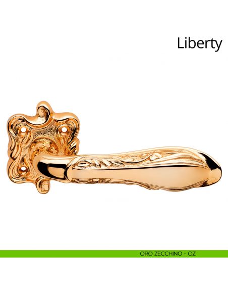 Maniglia per porta interna Liberty Linea Calì con rosetta artistica oro zecchino