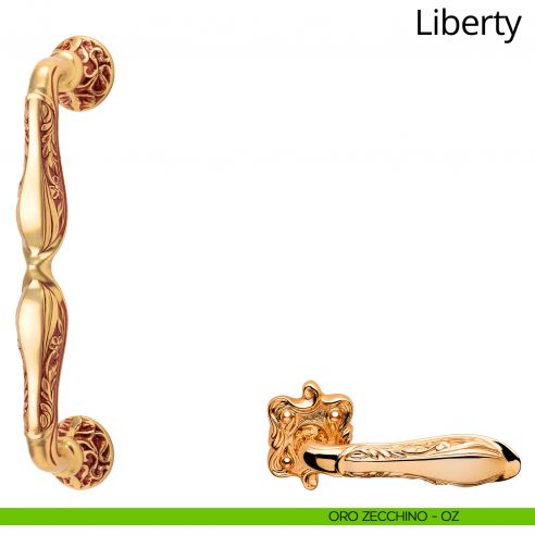 Maniglione dritto per porta Liberty Linea Calì con rosette tonde oro zecchino