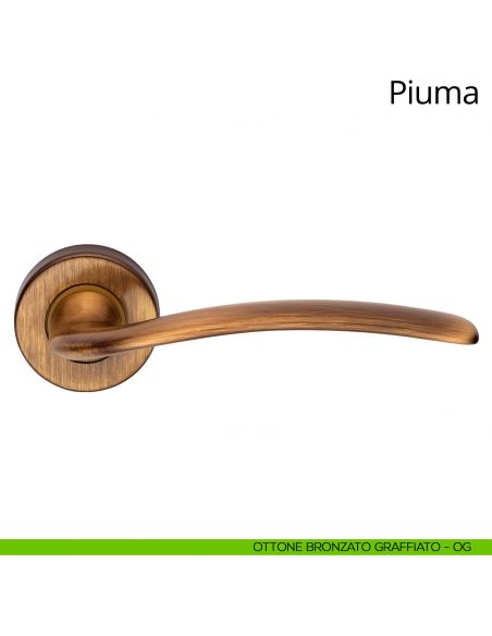 Maniglia per porta interna Piuma Linea Calì rosetta tonda ottone bronzato graffiato