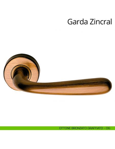 Maniglia per porta interna Garda Zincral Linea Calì rosetta tonda ottone bronzato graffiato
