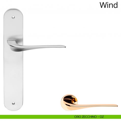 Maniglia con placca per porta Wind Linea Calì - oro zecchino - placca cieca