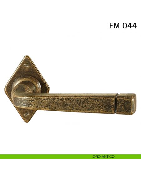Maniglia in ferro per porta Il Forgiato FM 044 con molla oro antico