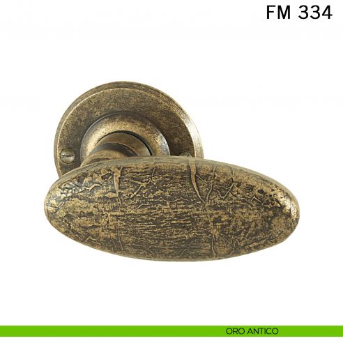 Maniglia in ferro per porta Il Forgiato FM 376 con molla oro antico