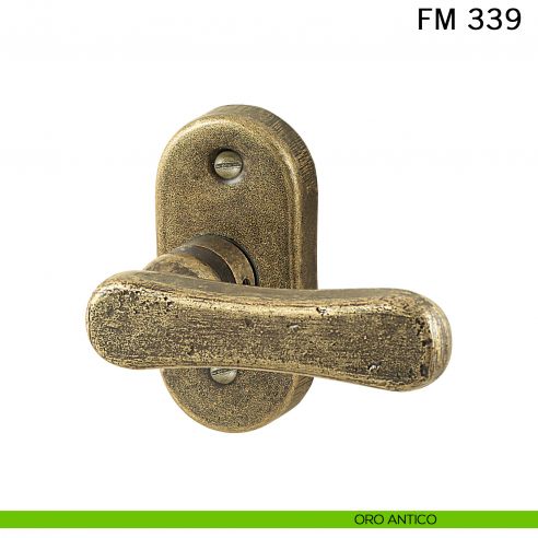 Maniglia in ferro per porta Il Forgiato FM 339 con rosetta ovale oro antico