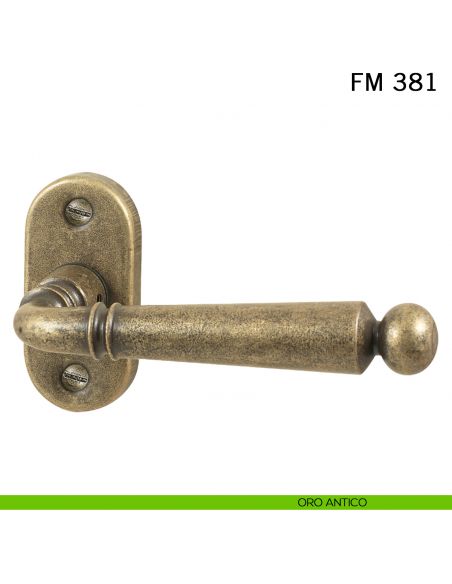 Maniglia in ferro per porta Il Forgiato FM 381 con rosetta ovale oro antico