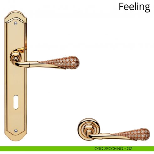 Maniglia con placca per porta interna Swarovski Feeling Linea Calì patent oro zecchino