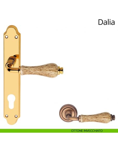 Maniglia porcellana maculata con placca per porta Dalia Linea Calì yale ottone bronzato graffiato