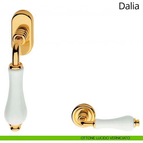 Maniglia con porcellana bianca per finestra martellina DK Dalia Linea Calì ottone lucido verniciato