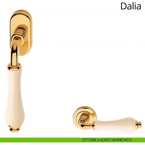Maniglia con porcellana avorio per finestra martellina DK Dalia Linea Calì ottone lucido verniciato