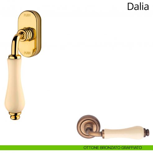 Maniglia porcellana avorio per finestra martellina DK antintrusione Dalia Linea Calì ottone bronzato graffiato