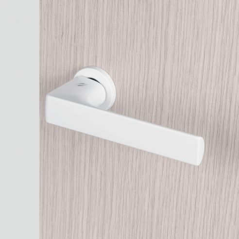 Maniglia per porta Robocinque Colombo Design con rosetta minimale Zero Evolution